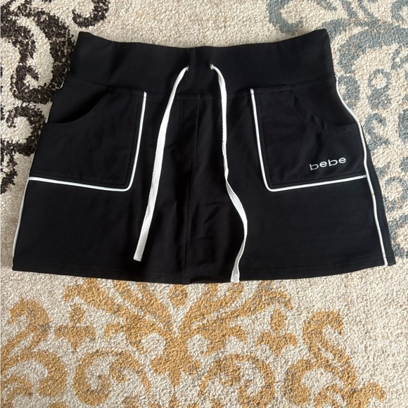bebe Dresses & Skirts - Bebe Elegant Black Skirt with White Accents
